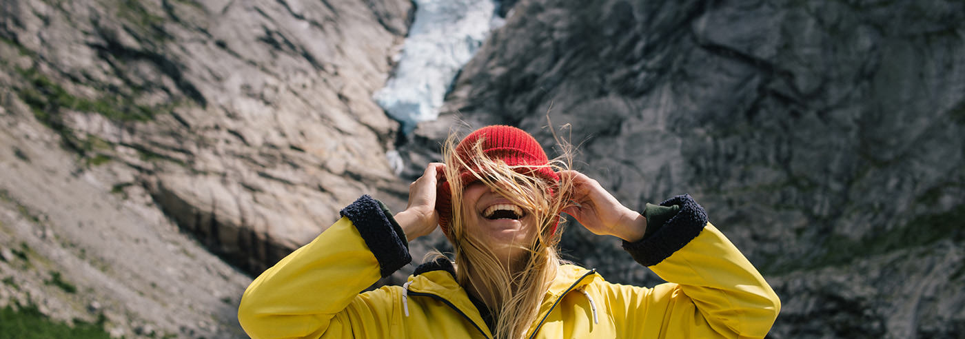Solnedgang over fjellrygg ved Styggedalstraversen i Jotunheimen